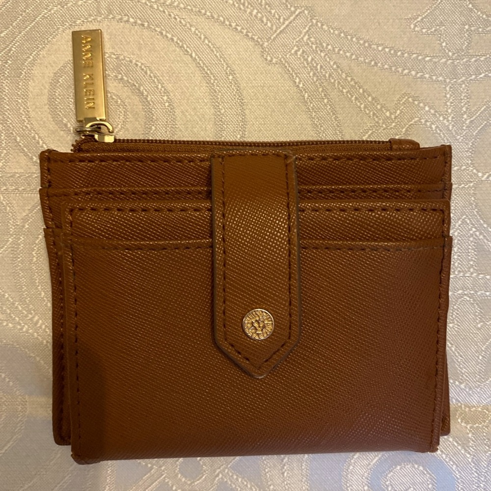 EUC Anne Klein wallet, clean, zipper & snap work. Small cracks in fold as shown.